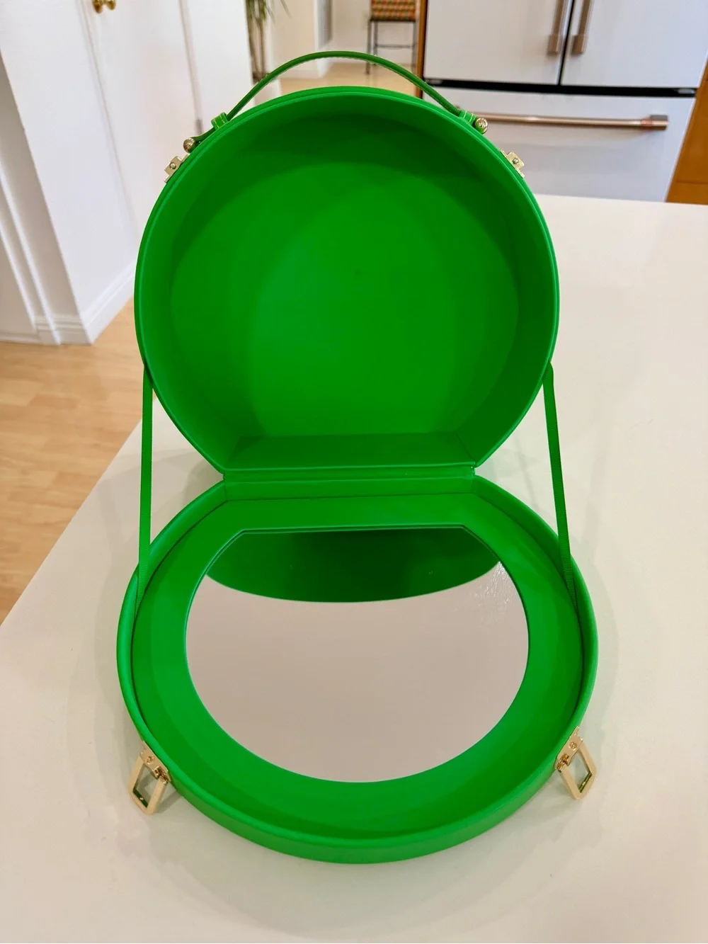 Tata Harper Bright Green Round Cosmetic Case with Gold Logo